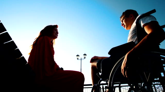 Young-Man-Plays-The-Piano-For-A-Red-Girl-In-A-Wheelchair