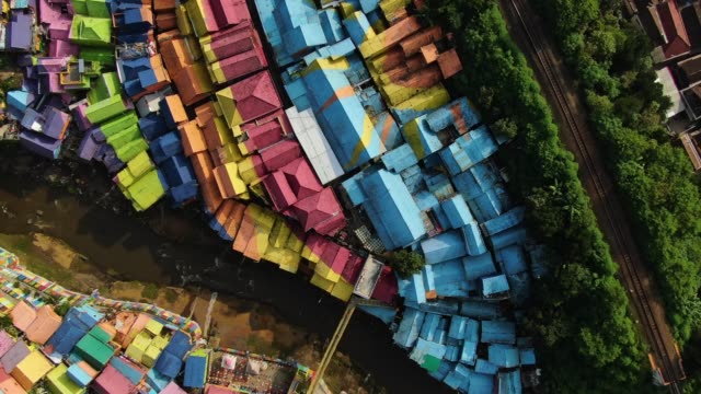 Aerial-shoot-of-Colorful-Village-(Kampung-Warna-Warni)-Jodipan-and-Tridi-Village,-Malang-East-Java,-Indonesia,-Asia