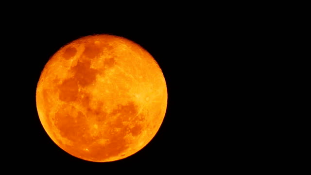 Rising-bloodmoon-or-red-moon-on-dark-sky