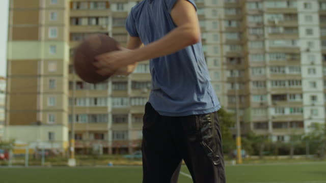 Streetball-player-training-chest-pass-on-court