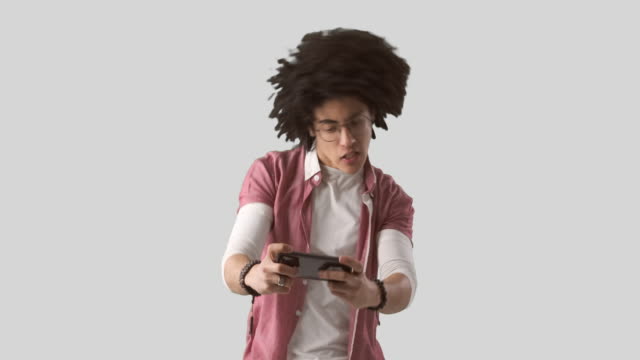 Crazy-man-playing-game-on-mobile-phone