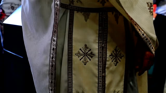 Close-up-of-a-priest-swinging-the-Thurman-in-an-orthodox-church,-slow-motion