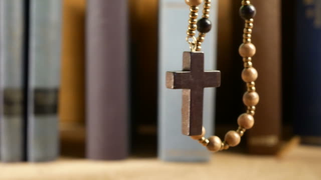 Wooden-Rosary-Hanging-in-Front-of-Library.-No-Movement-Camera.
