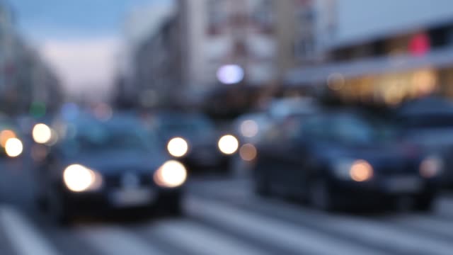 Bokeh-car-light-at-night.-Out-of-focus-traffic-lights.