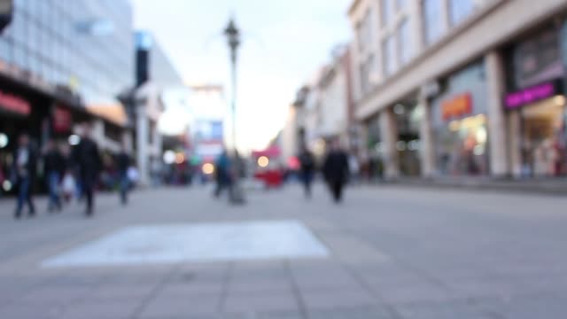 blurred-background-defocused-people-walking-on-street