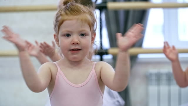 Adorable-Little-Girl-Clapping-Hands