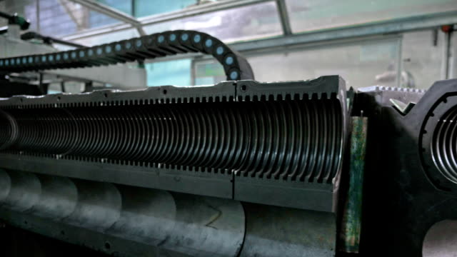 Manufacture-of-plastic-water-pipes.-Manufacturing-of-tubes-to-the-factory.-The-process-of-making-plastic-pipes-on-the-machine-tool-with-the-use-of-water-and-air-pressure.-Special-corrugated-forms.