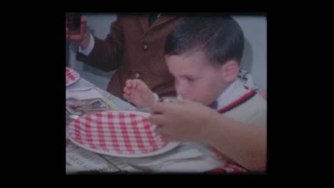 1963-Jewish-family-recites-prayer-over-wine-at-Passover-seder