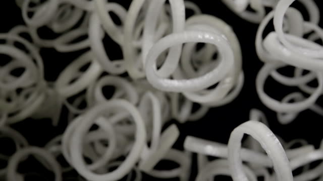 Falling-of-sliced-white-onion.-Slow-motion-240-fps