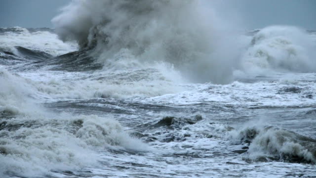High-wave-breaking-on-the-rocks-of-the-coastline.-Extremely-Big-Wave-crushing-coast-,-Large-Ocean-Beautiful-Wave.-Super-Slow-Motion.