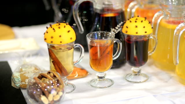 Cups-of-mulled-wine-with-slice-of-orange-and-cinnamon.-Christmas-mood