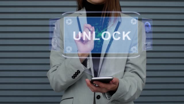Business-woman-interacts-HUD-hologram-Unlock