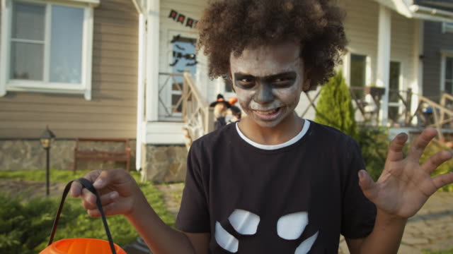 African-Teenager-Trick-or-Treating