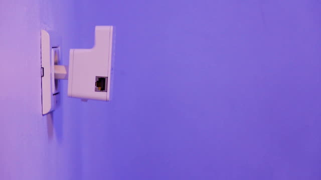 WiFi-repeater-in-electrical-socket-on-the-wall