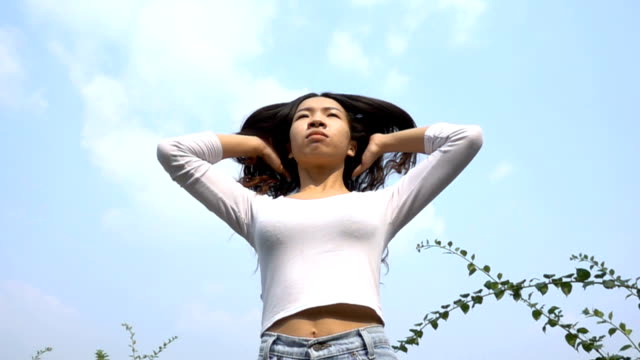 Slow-motion-of-Asian-woman-with-hair-motion.