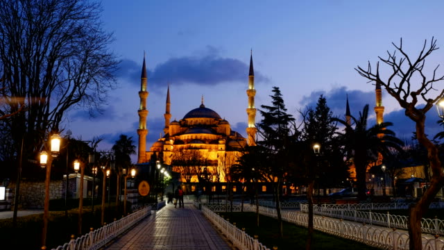 People-walking-near-Blue-mosque-of-Istanbul-at-evening-time