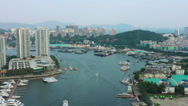 sunny-evening-hainan-island-sanya-bay-water-traffic-dock-aerial-panorama-4k-china