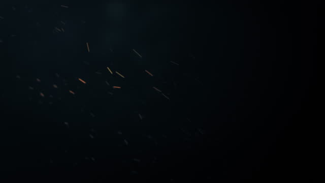 Funkenflug-Feuer-mit-Rauch,-abstrakte-Animation-von-fliegenden-Teilchen-mit-Motion-blur