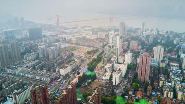 china-cloudy-day-time-wuhan-cityscape-riverside-aerial-panorama-4k-time-lapse