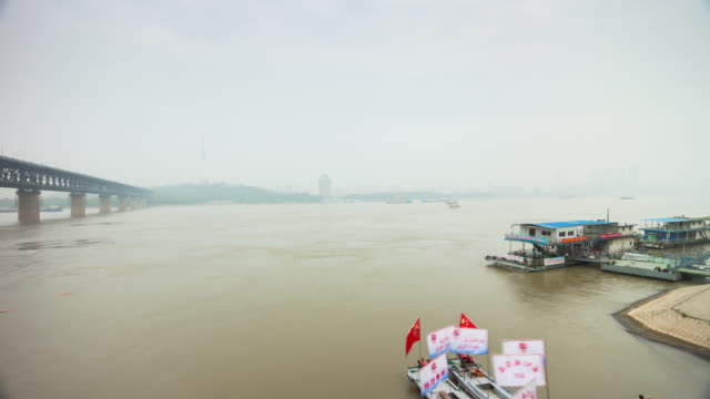 day-time-wuhan-yangtze-traffic-river-ferry-terminal-bay-panorama-4k-time-lapse-china