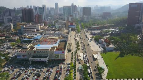 soleado-día-zhuhai-paisaje-famoso-centro-comercial-tráfico-carretera-panorama-aéreo-4k-china