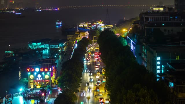 night-illumination-wuhan-city-traffic-street-rooftop-panorama-4k-time-lapse-china