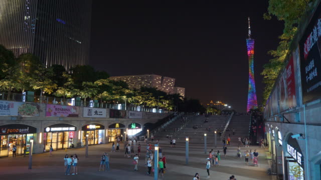 night-illuminated-guangzhou-city-famous-canton-tower-crowded-square-panorama-4k
