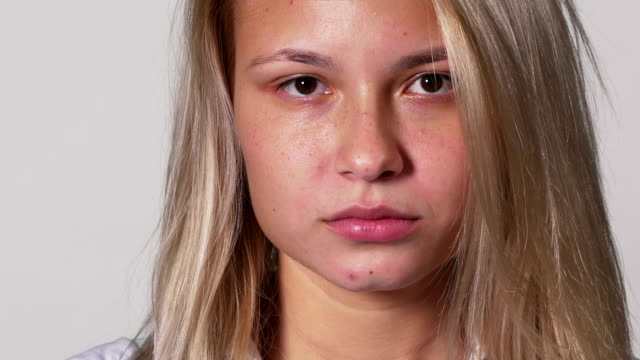 Close-up-portrait-of-beautiful-sad-female-teenager