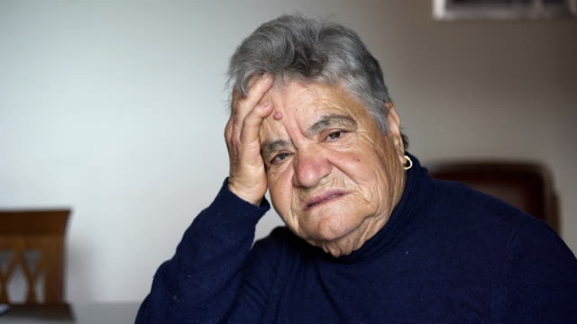 depressed-sad-old-woman-alone-at-home