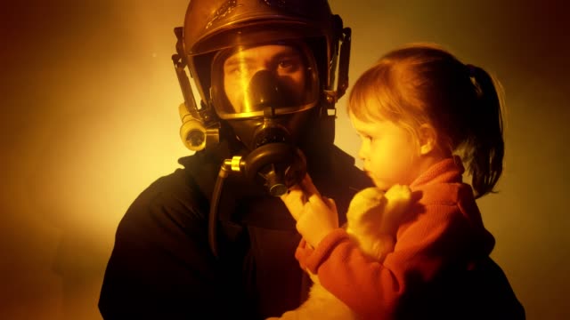 Firefighters-with-rescued-child