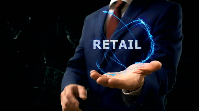 Businessman-shows-concept-hologram-Retail-to-online-of-internet-on-his-hand