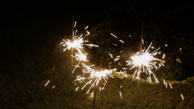 Bengal-fire-burns-on-the-ground-with-bright-sparks
