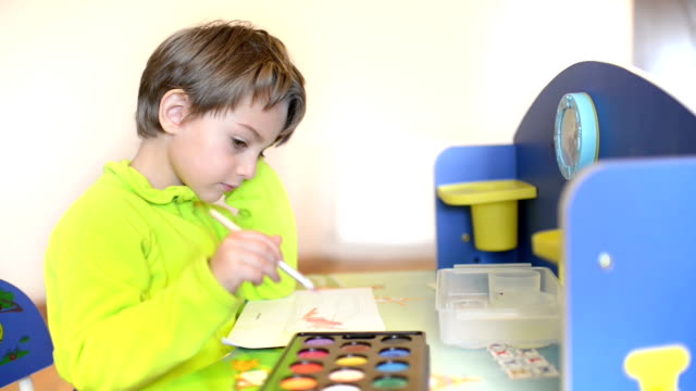 Kid-Painting-at-Kindergarten