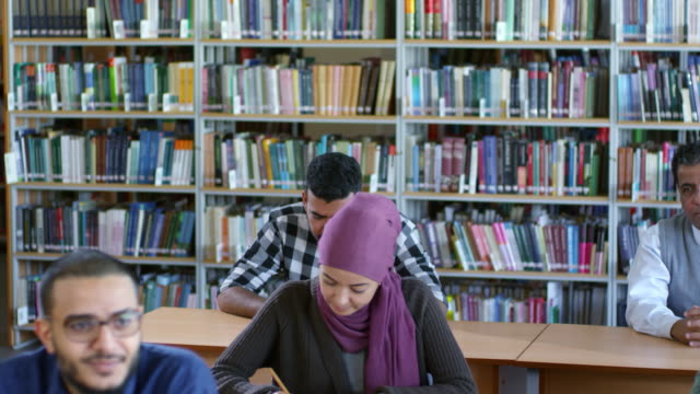 Young-Woman-in-Hijab-at-Lesson