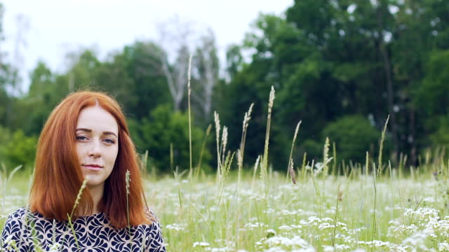 Deep-look-of-red-haired-woman-outdoors,-calmness,-place-for-text-ad,-slow-motion