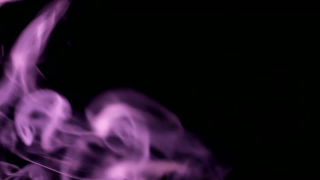 Purple-Steam-Rises-from-up.-Blue-smoke-over-a-black-background.-Smoke-slowly-floating-through-space-against-black-background.-4K-UHD