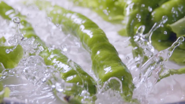 Falling-of-hot-pepper-into-the-wet-table.-Slow-motion-480-fps