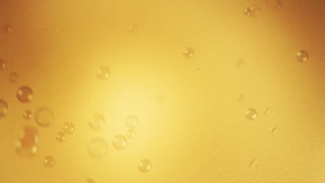 soap-bubbles-gold-background-hd-footage