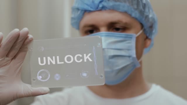Doctor-uses-tablet-with-text-Unlock