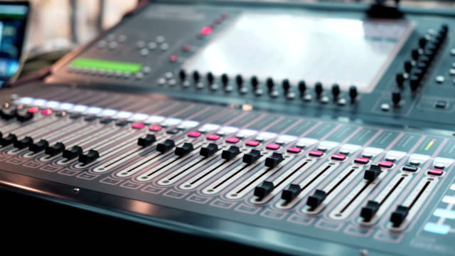 Audio-Mixer-in-a-Studio-the-Automatic-Soundboard-knobs-Moving
