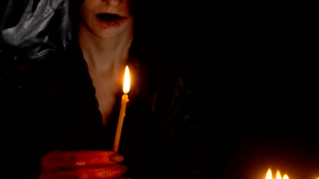 Mujer-en-campana-sople-velas