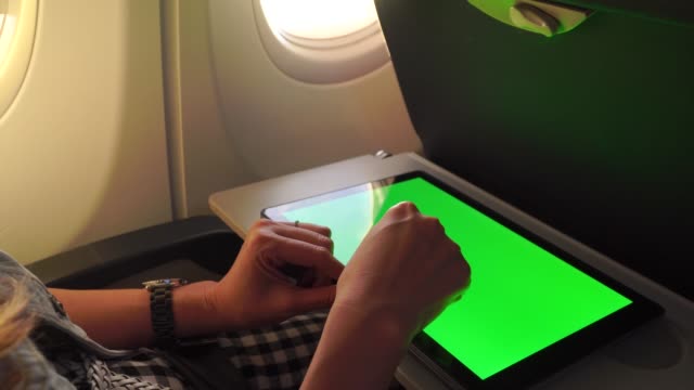working-with-laptop-tablet-pc-on-aircraft,green-screen-and-chroma-key.