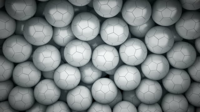 Soccer-balls-falling,-filling-the-video,-transition+alpha-channel---Stock-video
