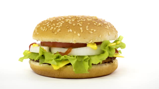 Rotation.-Appetitliche-Burger-auf-weißem-Hintergrund