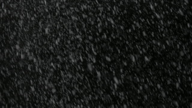 Elemento-de-vfx-Navidad-tormenta-de-nieve-en-la-pantalla-en-negro.