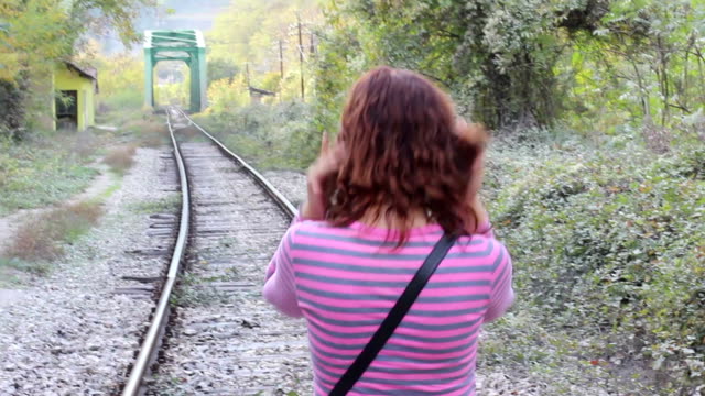A-girl-on-a-railroad-track