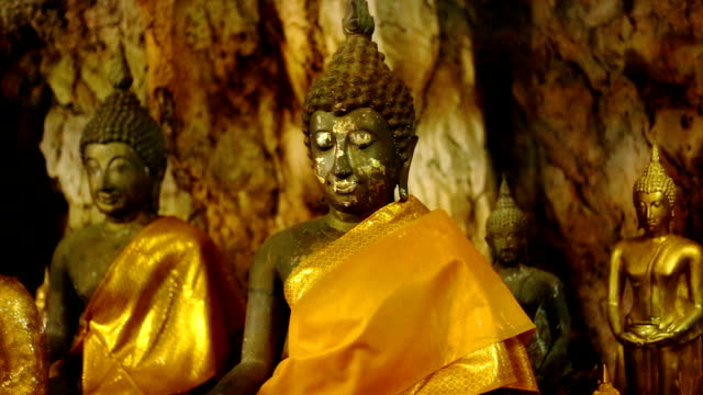 Gold-Buddha-statues-at-Tiger-Cave-Temple-Wat-Tham-Sua-,-Kanchanaburi-Province,-Thailand