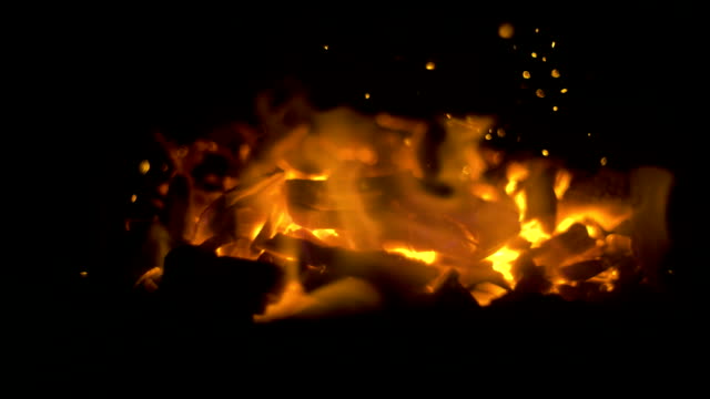 Flying-glowing-bonfire-embers-into-the-dark