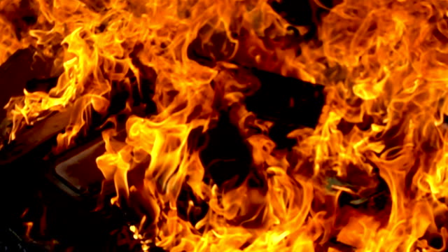 Close-up-of-fire-burn-wood-pile-with-slow-motion