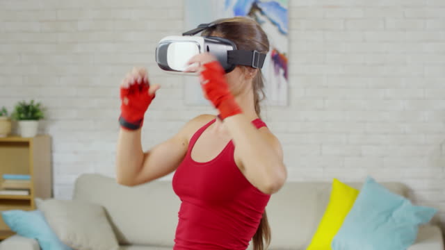Woman-in-VR-Goggles-Practicing-Shadowboxing